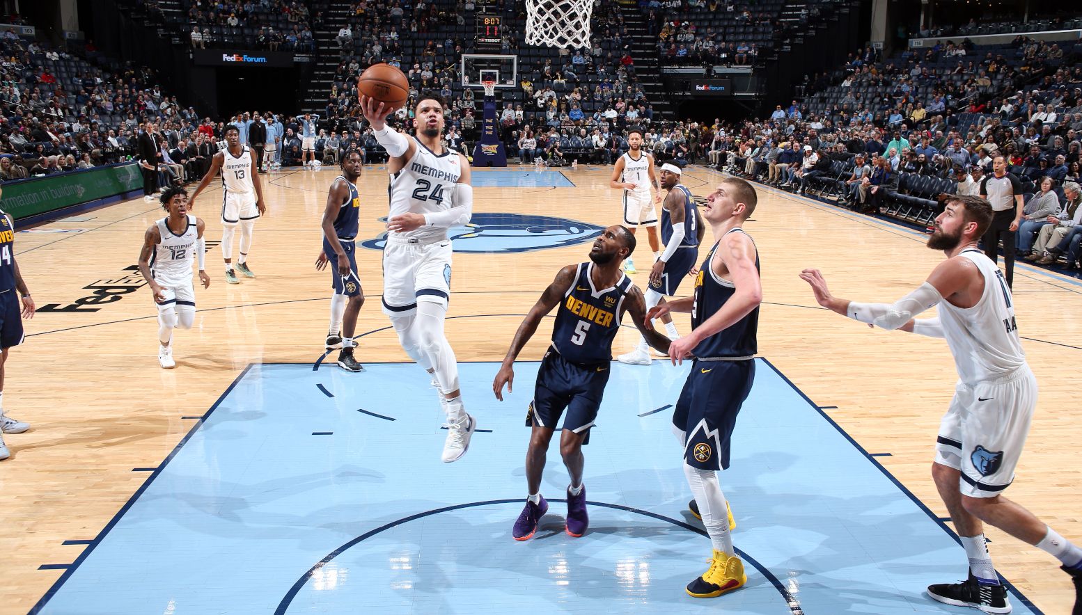 Postgame Report Brooks, Valanciunas lead Grizzlies past Nuggets 10496