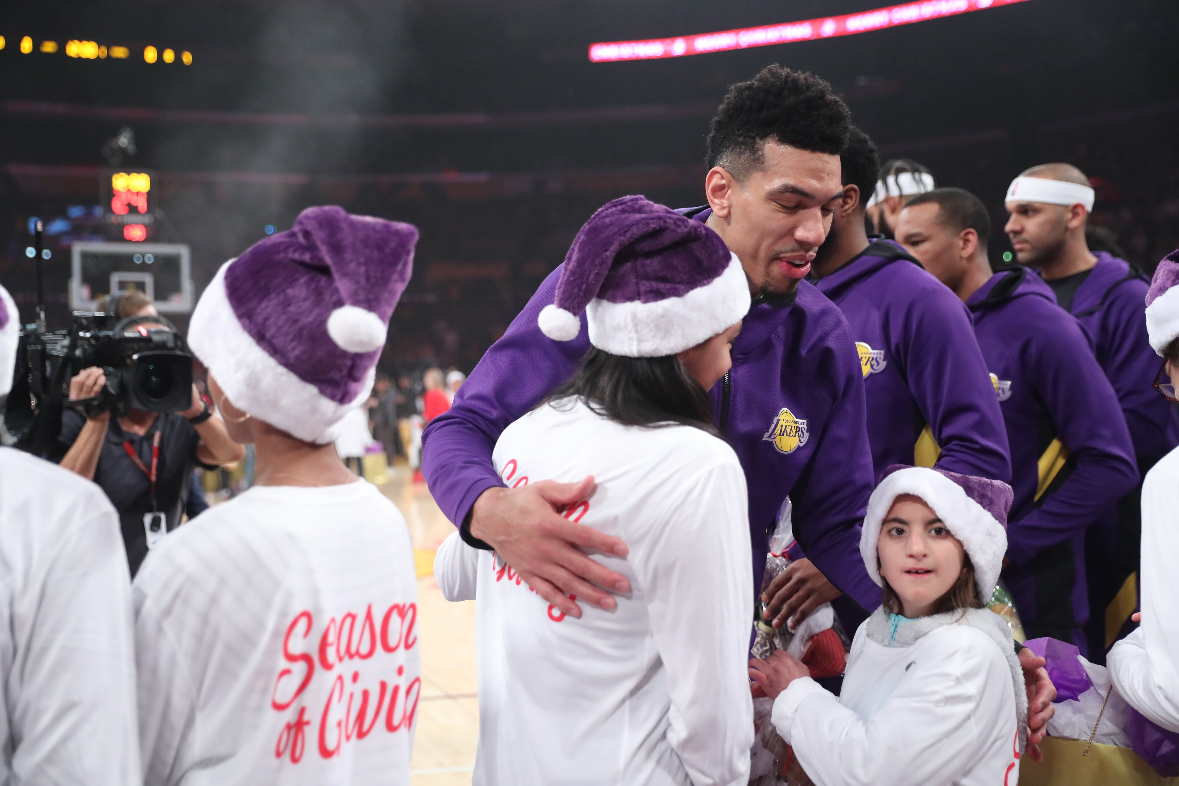 Slideshow-image: Lakers On-Court Gift Exchange for NBA Cares Season of Giving 19-20...