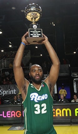 Marcus Landry of the Reno Bighorns celebrates with his trophy after winning the 3-point shooting contest during the NBA D-League Dream Factory at Jam Session during the NBA All-Star