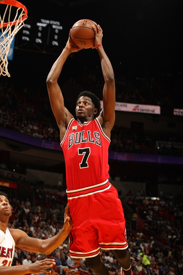 Justin Holiday's Career in Photos Photo Gallery