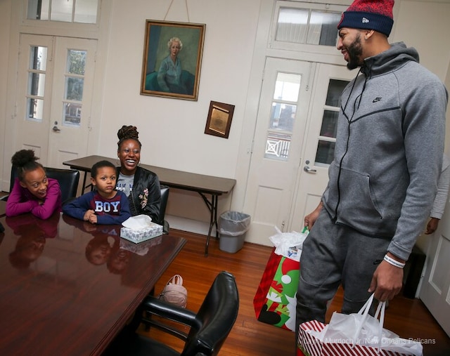 Slideshow-image: Anthony Davis of the New Orleans Pelicans surprises a local family at Kingsley House and gives away a car on December 12, 2017....