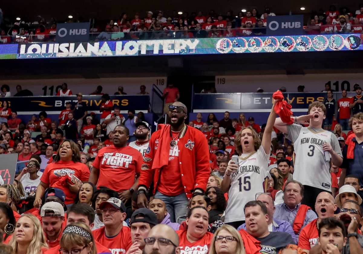 Slideshow-image: New Orleans Pelicans fans cheer on the team in Game 4 of the first round of the NBA Playoffs against the Phoenix Suns on Sunday, April 24, 2022....