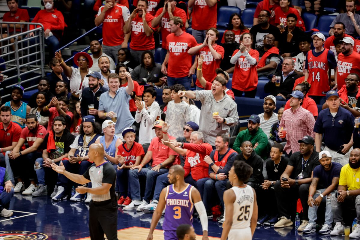 Slideshow-image: New Orleans Pelicans fans cheer on the team in Game 4 of the first round of the NBA Playoffs against the Phoenix Suns on Sunday, April 24, 2022....