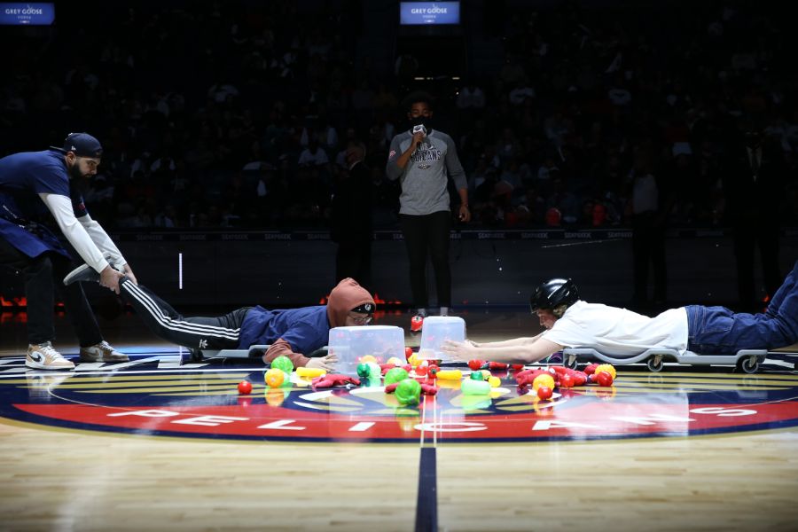 Lightbox-image: Watch New Orleans fans as they're entertained by the Hype Team, Drumline, halftime performance, and more during the Pelicans game against the Orlan...
