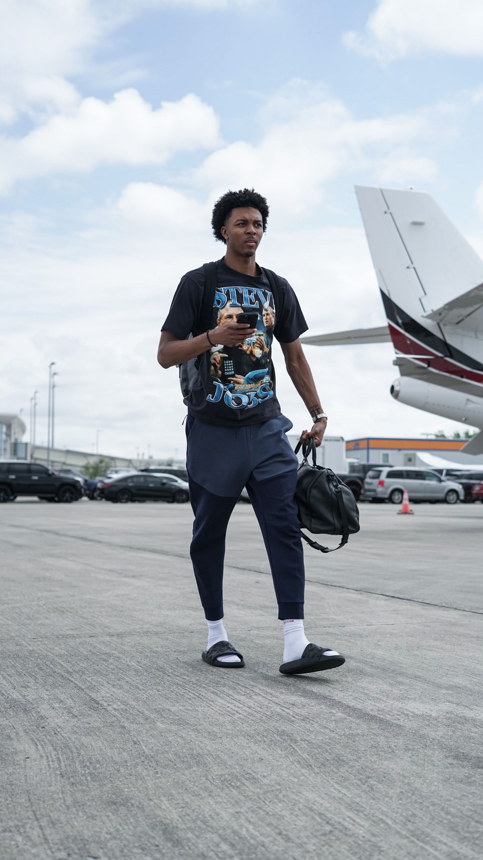 The New Orleans Pelicans board their plane to Los Angeles.