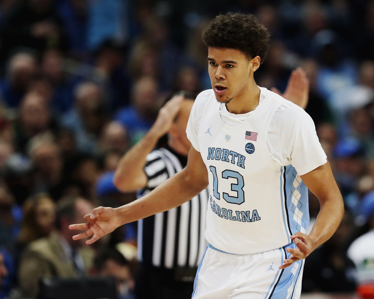 Slideshow-image: Both his parents played college basketball as his mother, Amy Schuler Johnson, scored over 1,000 points at Kent State and his father, Gilbert Johns...