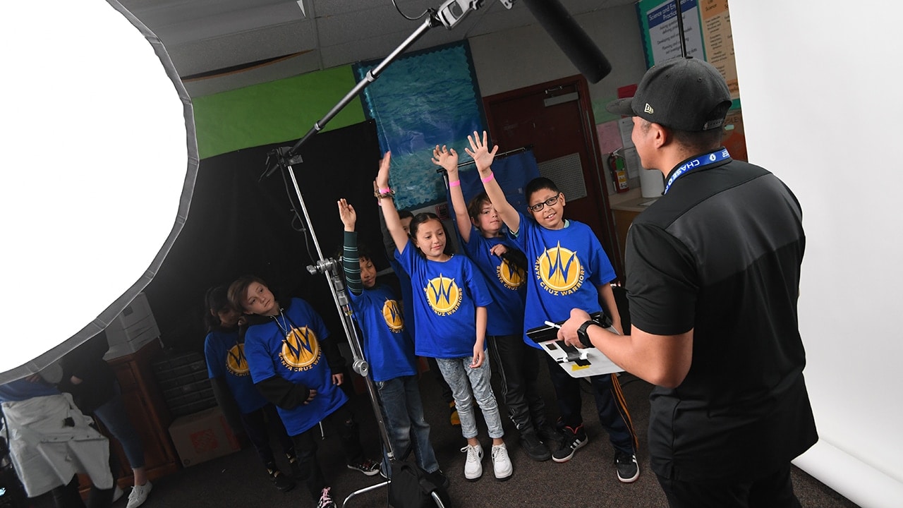 Slideshow-image: The Warriors, in partnership with Adobe, hosted a Peaceful Warriors Summit at Gault Elementary School in Santa Cruz. Santa Cruz Dubs Isiah Reese &a...
