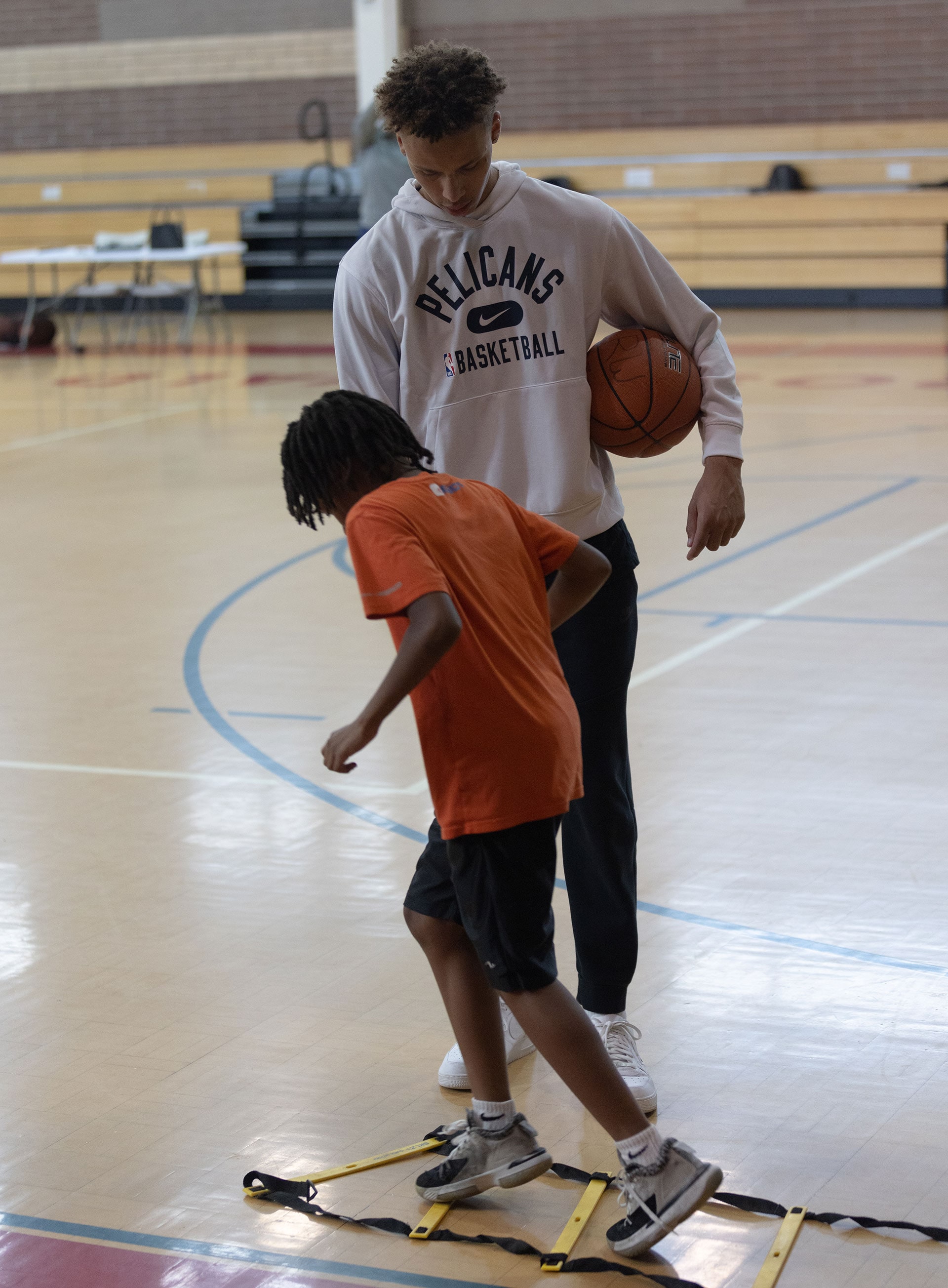 Lightbox-image: New Orleans Pelicans rookies Dyson Daniels and E.J. Liddell greet local NORD Athletes at Rosenwald Recreation Center on June 30, 2022....