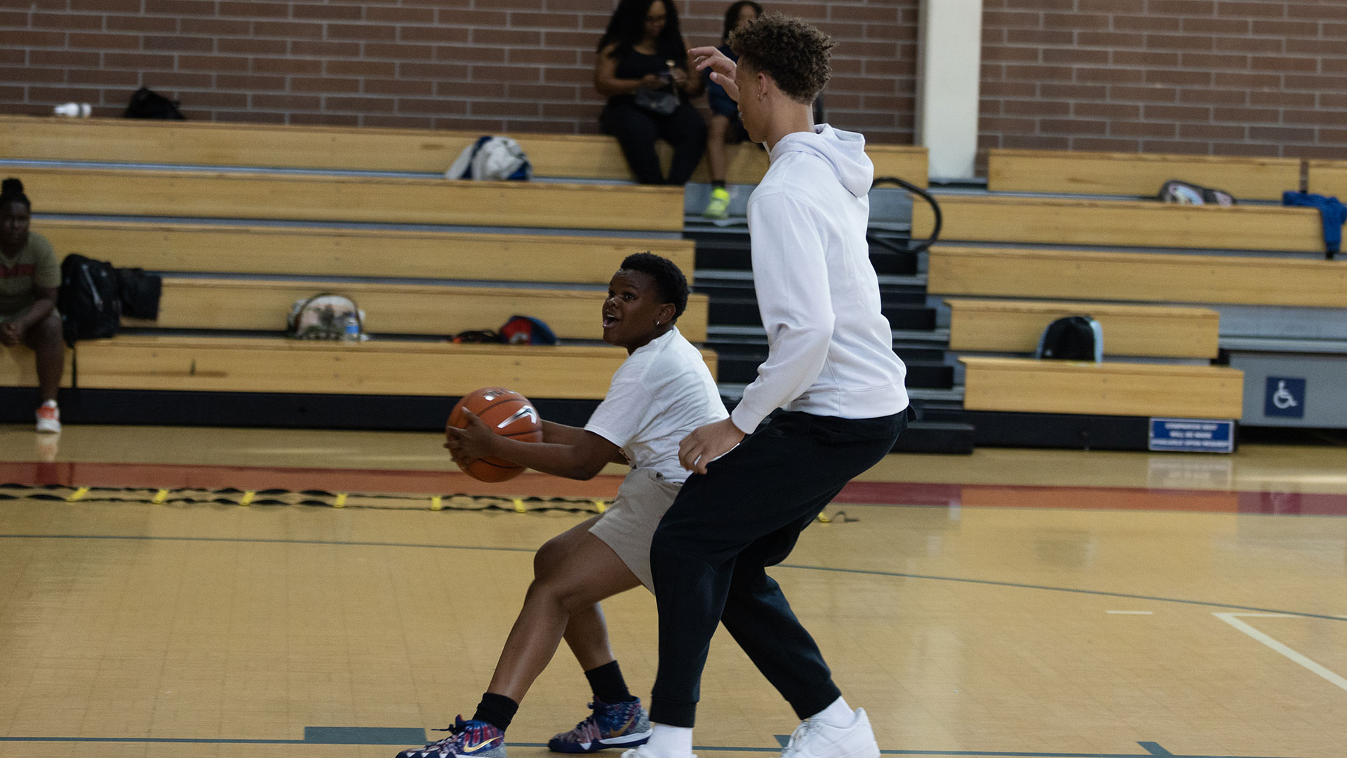 Lightbox-image: New Orleans Pelicans rookies Dyson Daniels and E.J. Liddell greet local NORD Athletes at Rosenwald Recreation Center on June 30, 2022....
