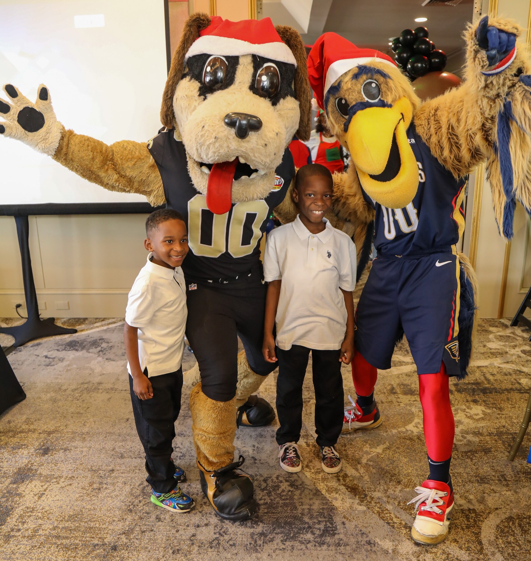 Photos Gayle Benson hosts holiday party for Women and Children's