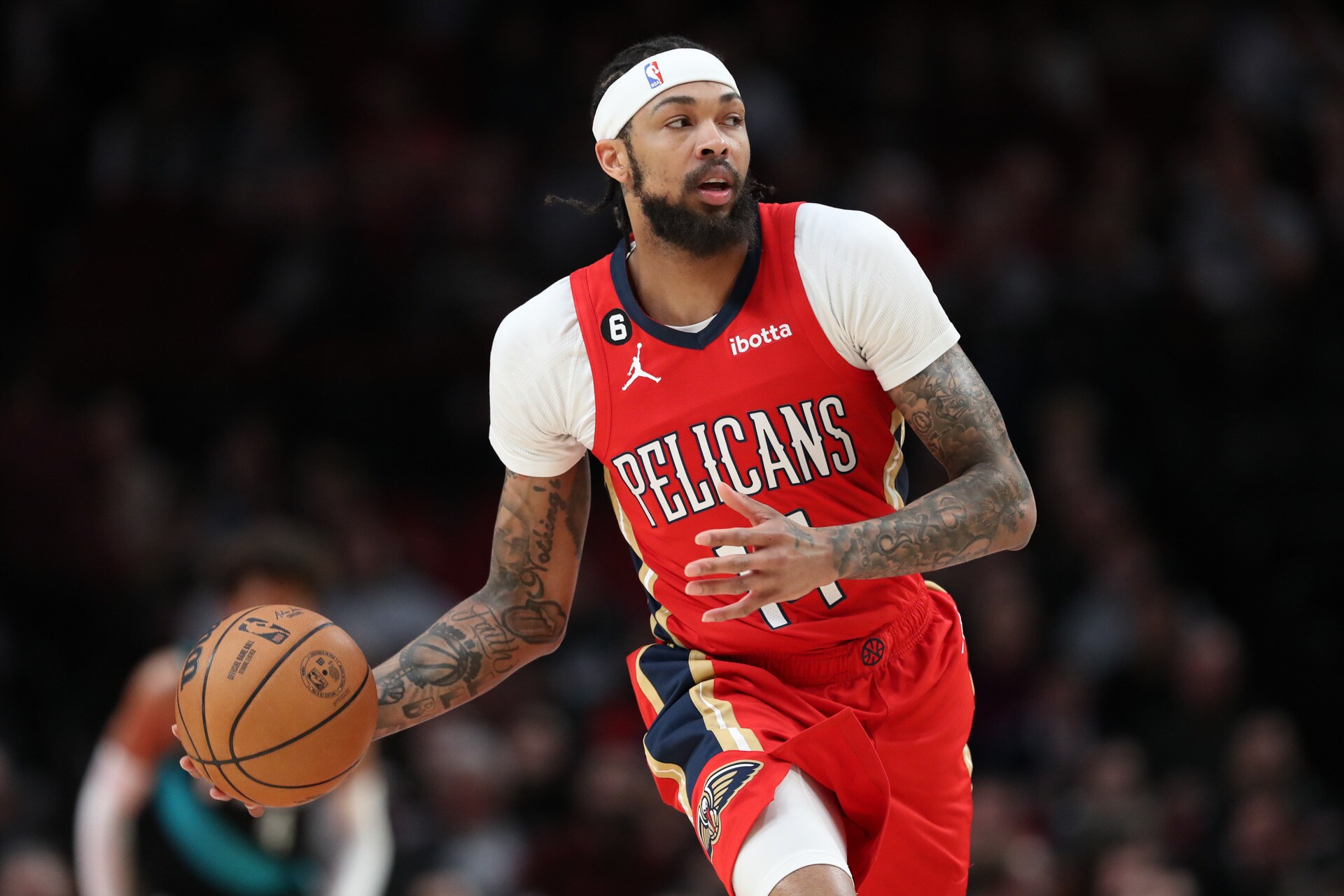 Slideshow-image: PORTLAND, OREGON - MARCH 27: Brandon Ingram #14 of the New Orleans Pelicans during the first quarter against the Portland Trail Blazers at Moda Cen...