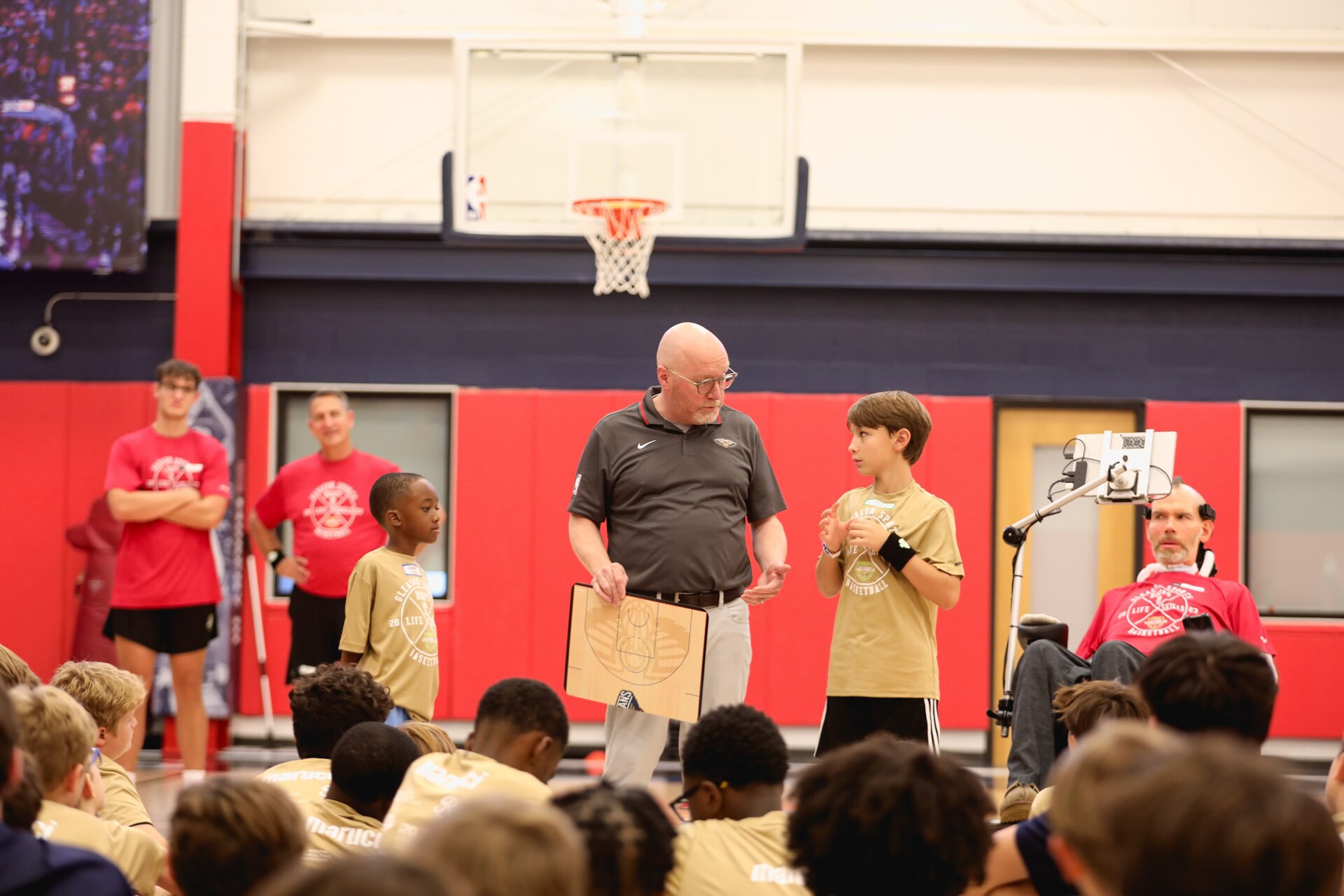 Photos Steve Gleason, Pelicans host youth basketball camp Photo