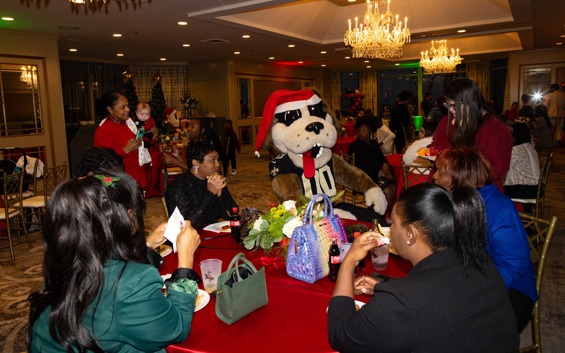 Photos Gayle Benson hosts holiday party for Raintree House Month of