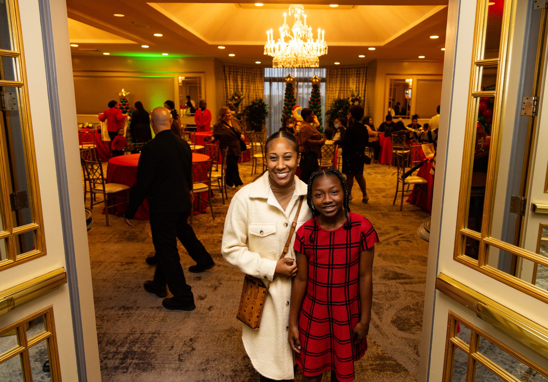 Photos Gayle Benson hosts holiday party for Raintree House Month of