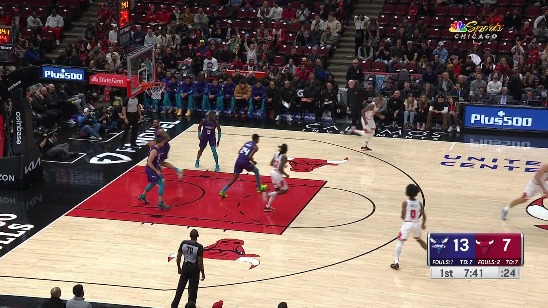 article-image: Vooch knocks down the top-of-the-arc three-pointer!