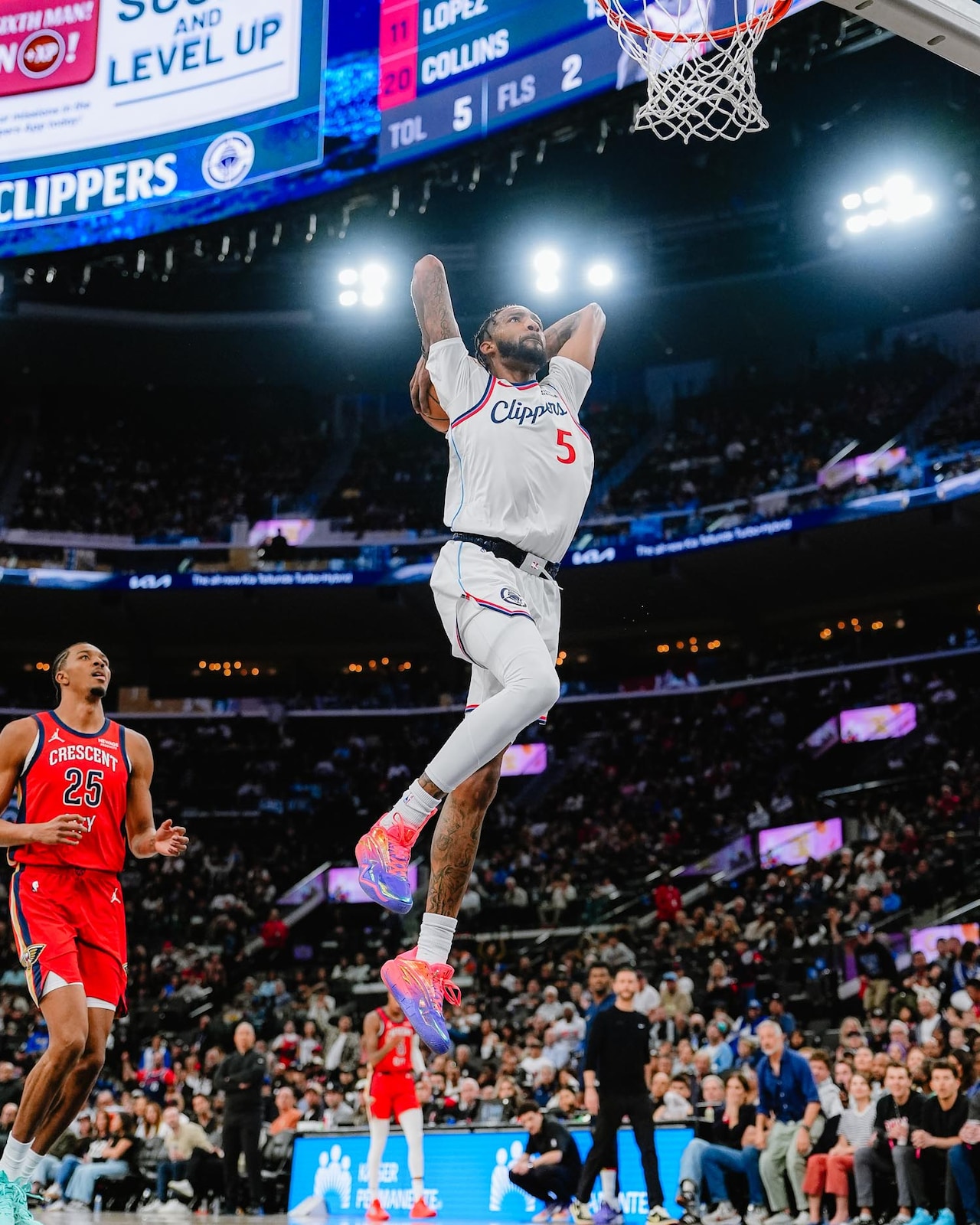 Derrick Jones Jr. finishes at the rim for the Clippers