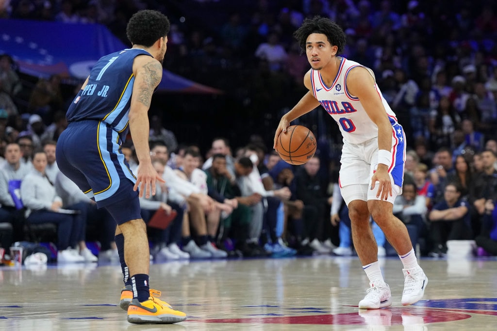 Jared McCain #20 of the Philadelphia 76ers dribbles the ball