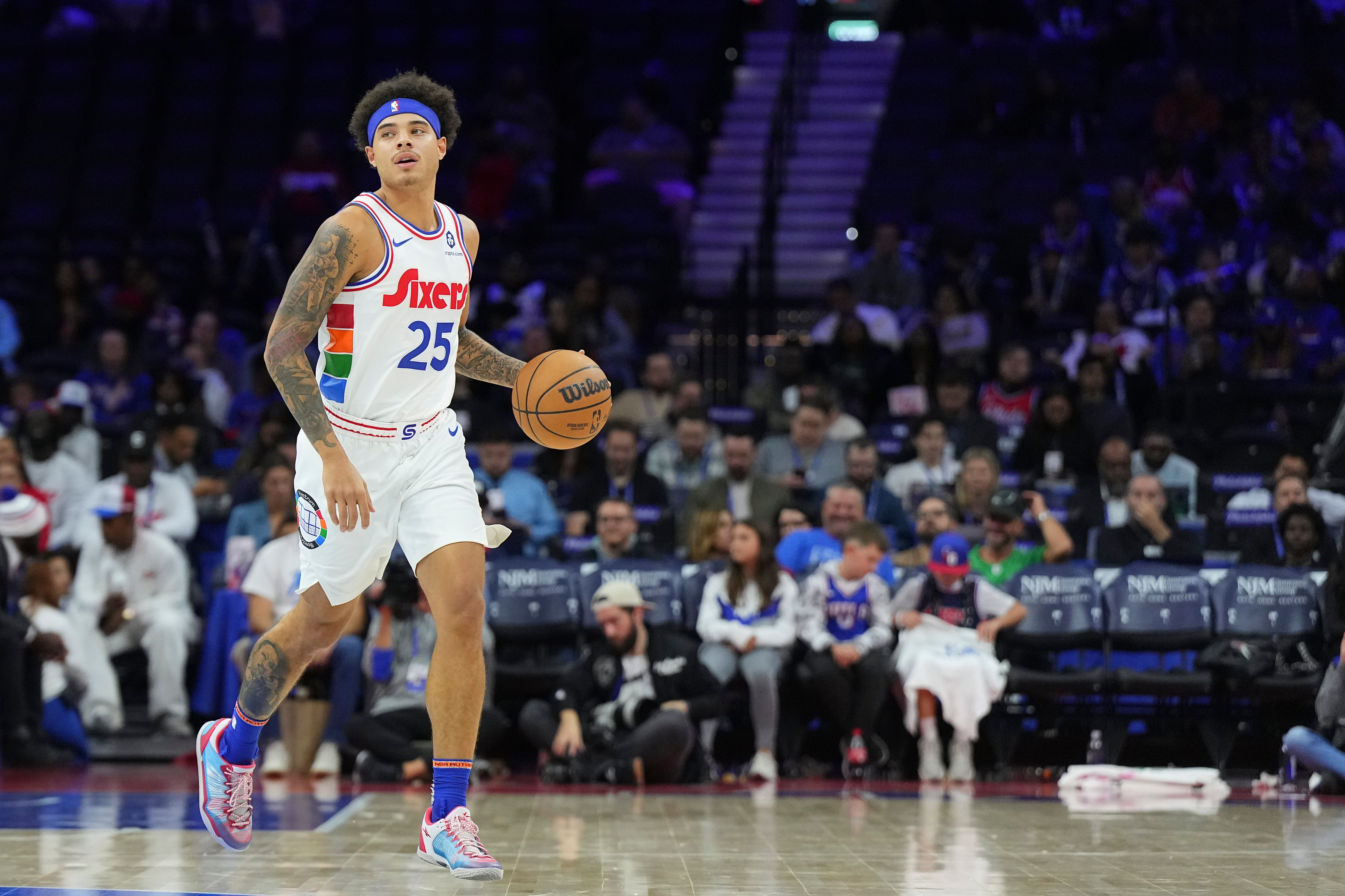 Lester Quinones #25 of the Philadelphia 76ers dribbles the ball 