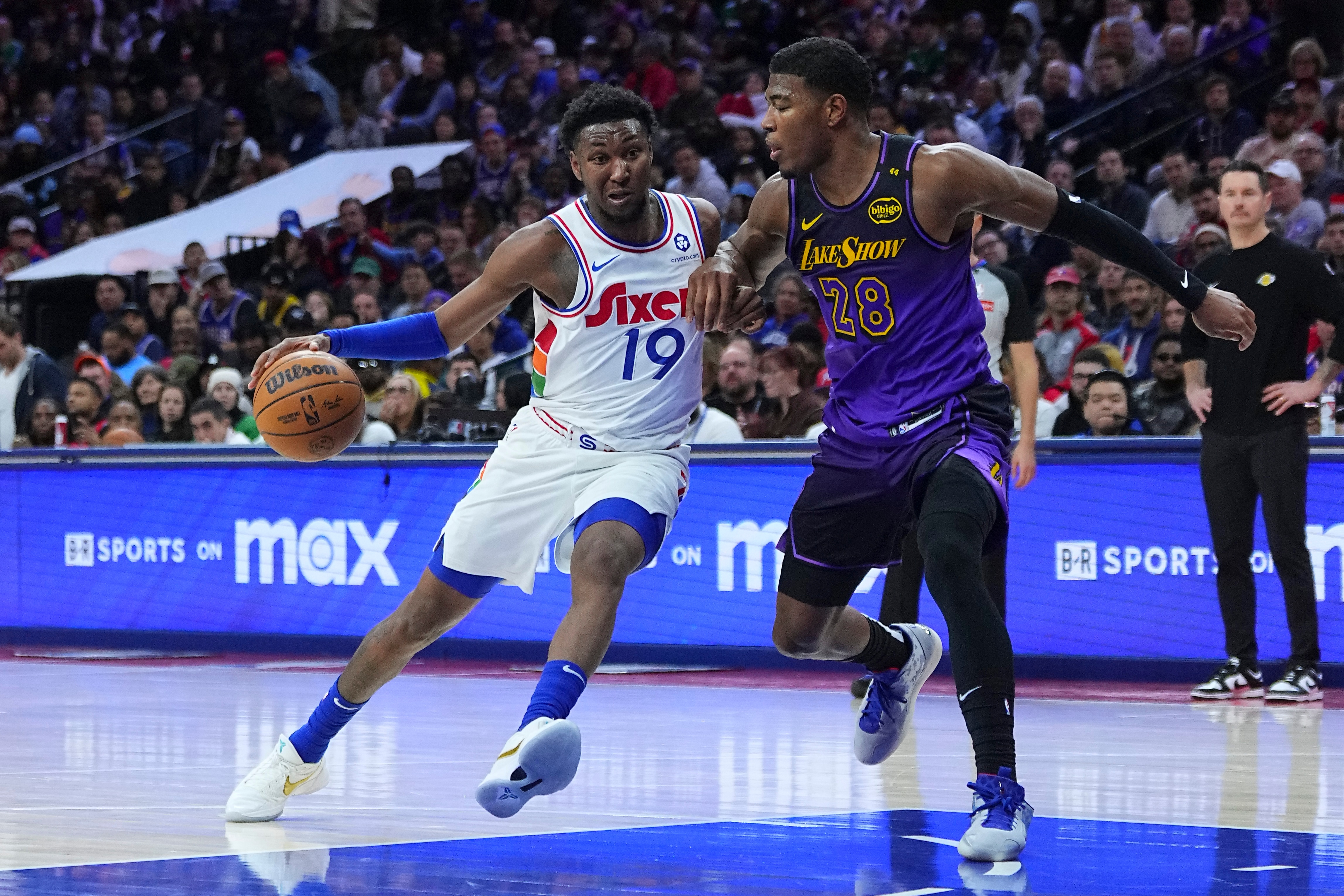 Justin Edwards #19 of the Philadelphia 76ers driving to the lane