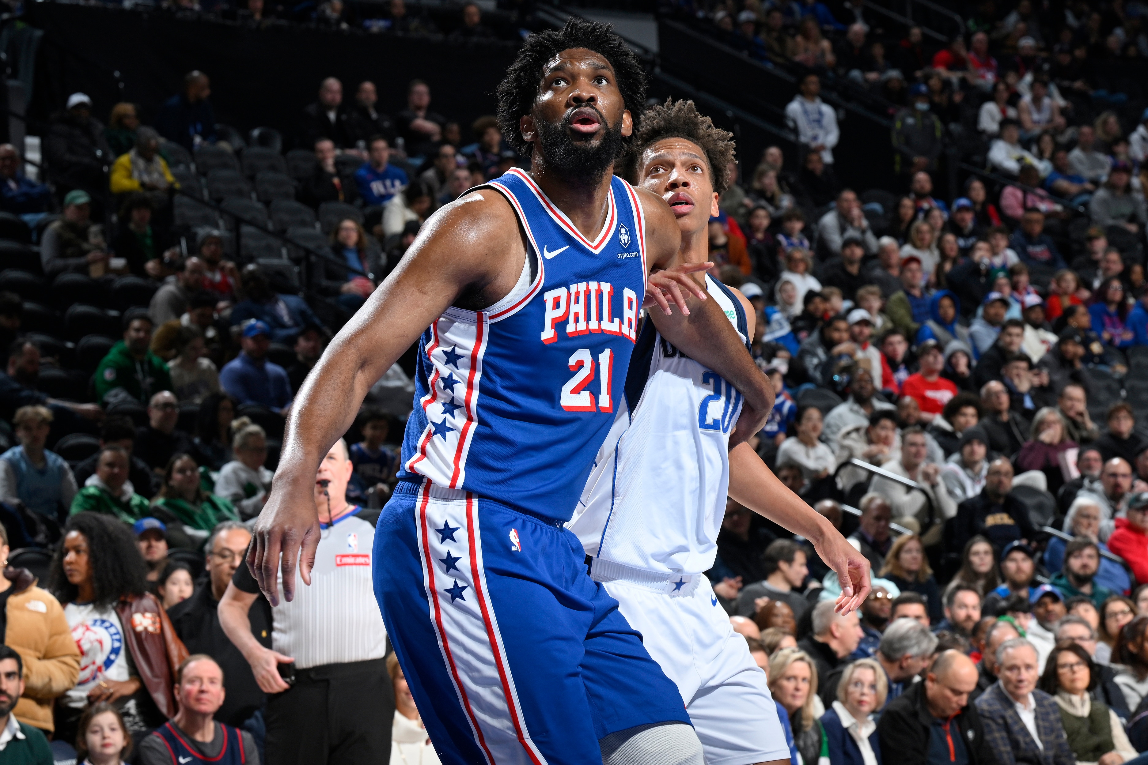 Joel Embiid #21 of the Philadelphia 76ers plays defense against