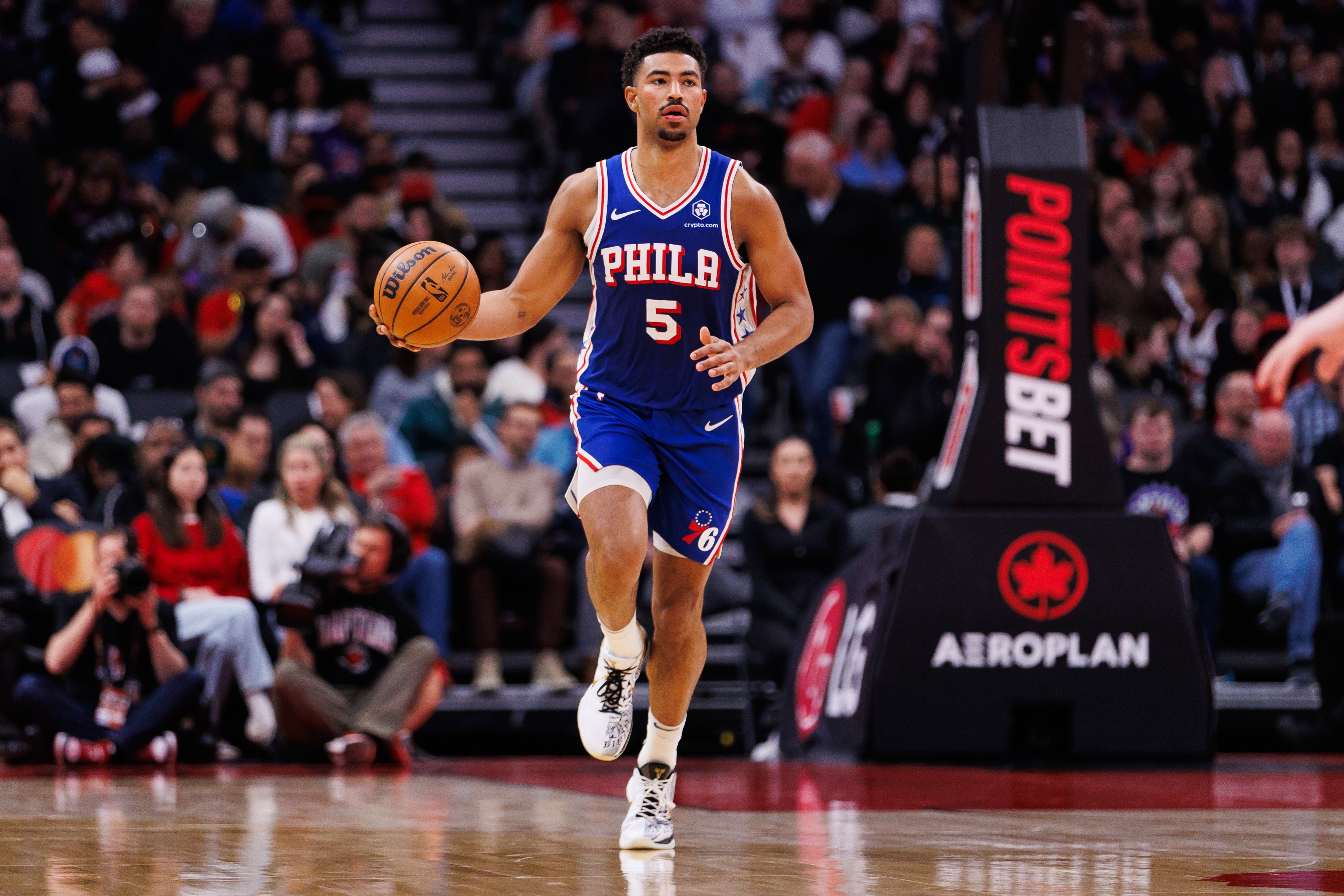 Quentin Grimes #5 of the Philadelphia 76ers dribbling the ball