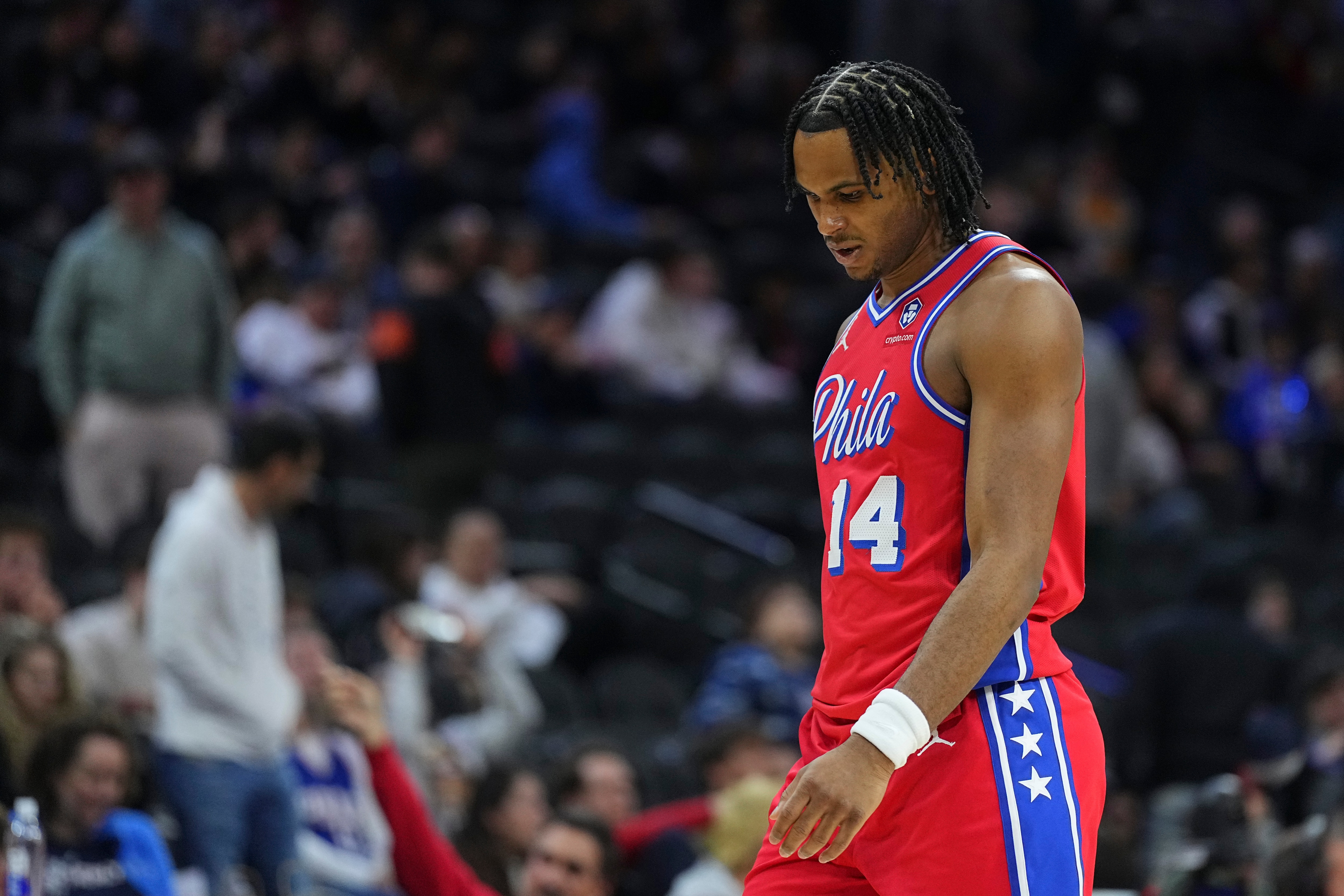 Ricky Council IV #14 of the Philadelphia 76ers looks down during game