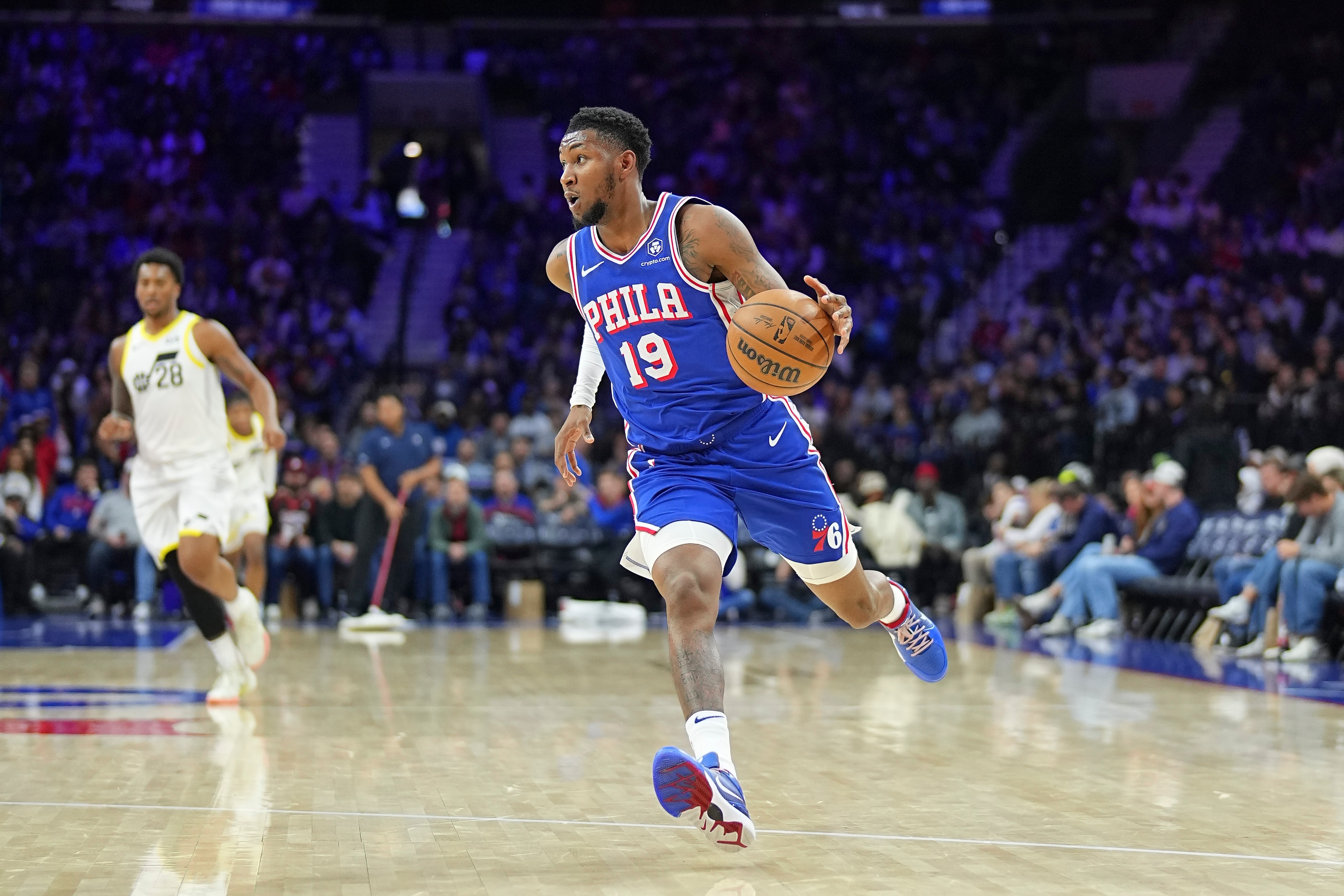 Justin Edwards #19 of the Philadelphia 76ers dribbles the ball against the Utah Jazz