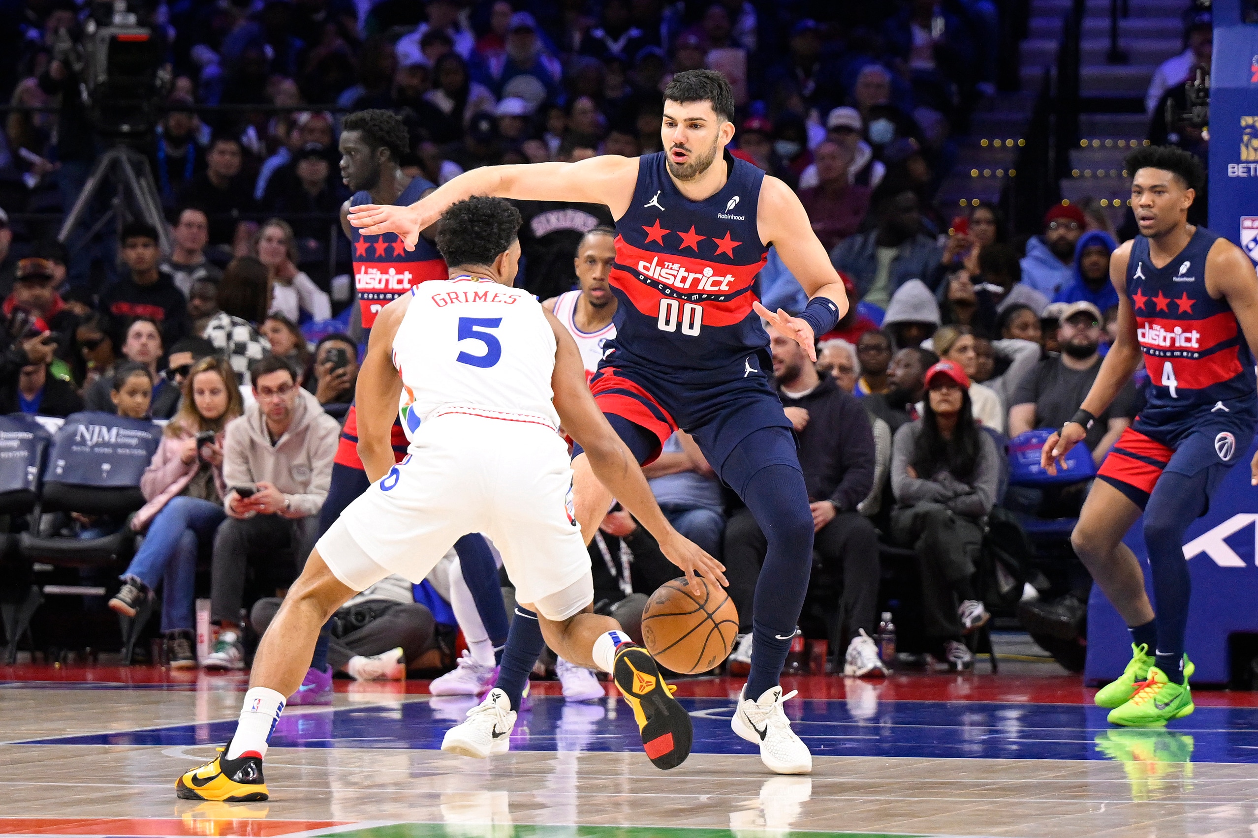 Quentin Grimes #5 of the Philadelphia 76ers diving to the basket during the game