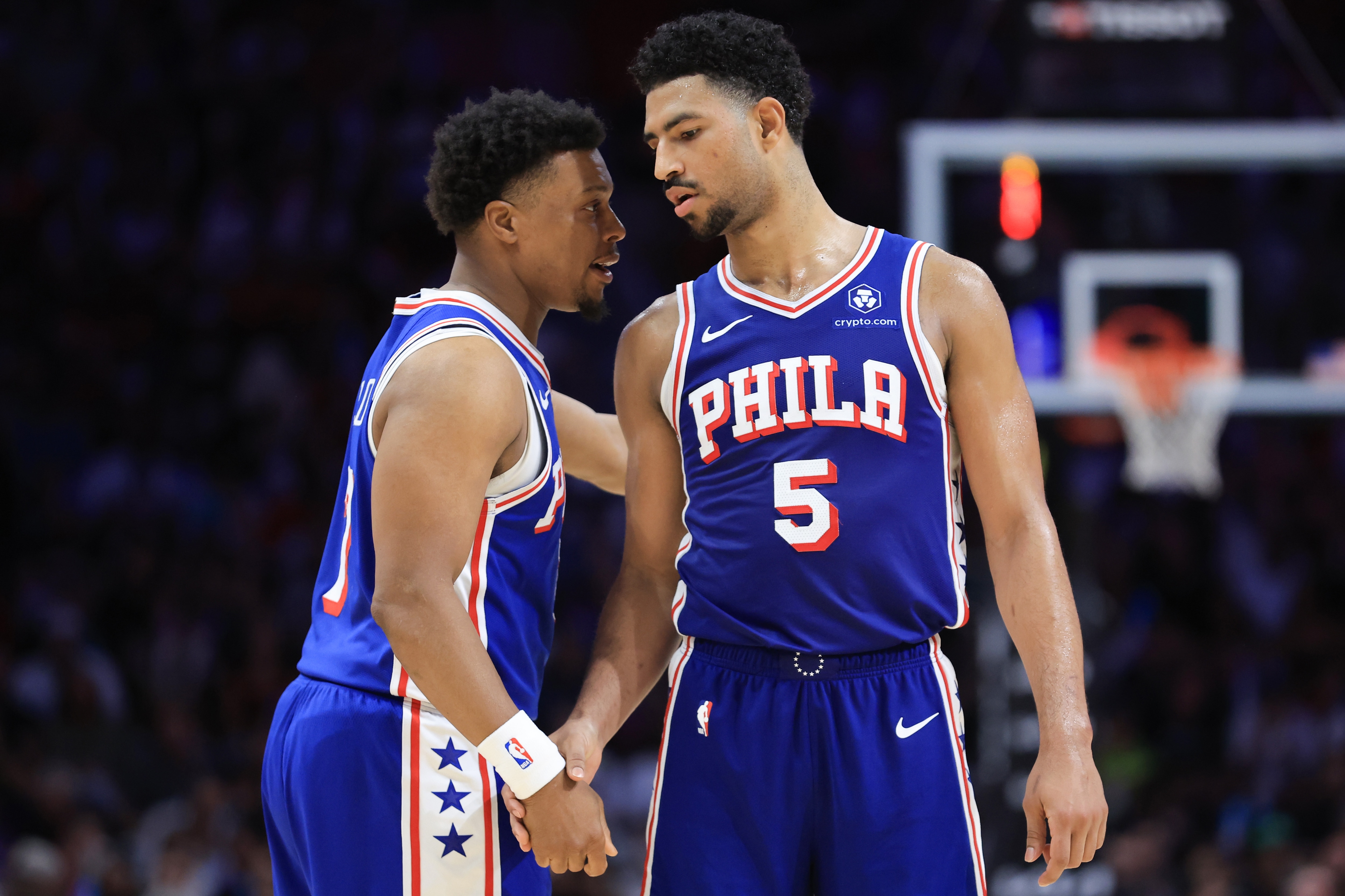 Kyle Lowry #7 and Quentin Grimes #5 of the Philadelphia 76ers speak on the court