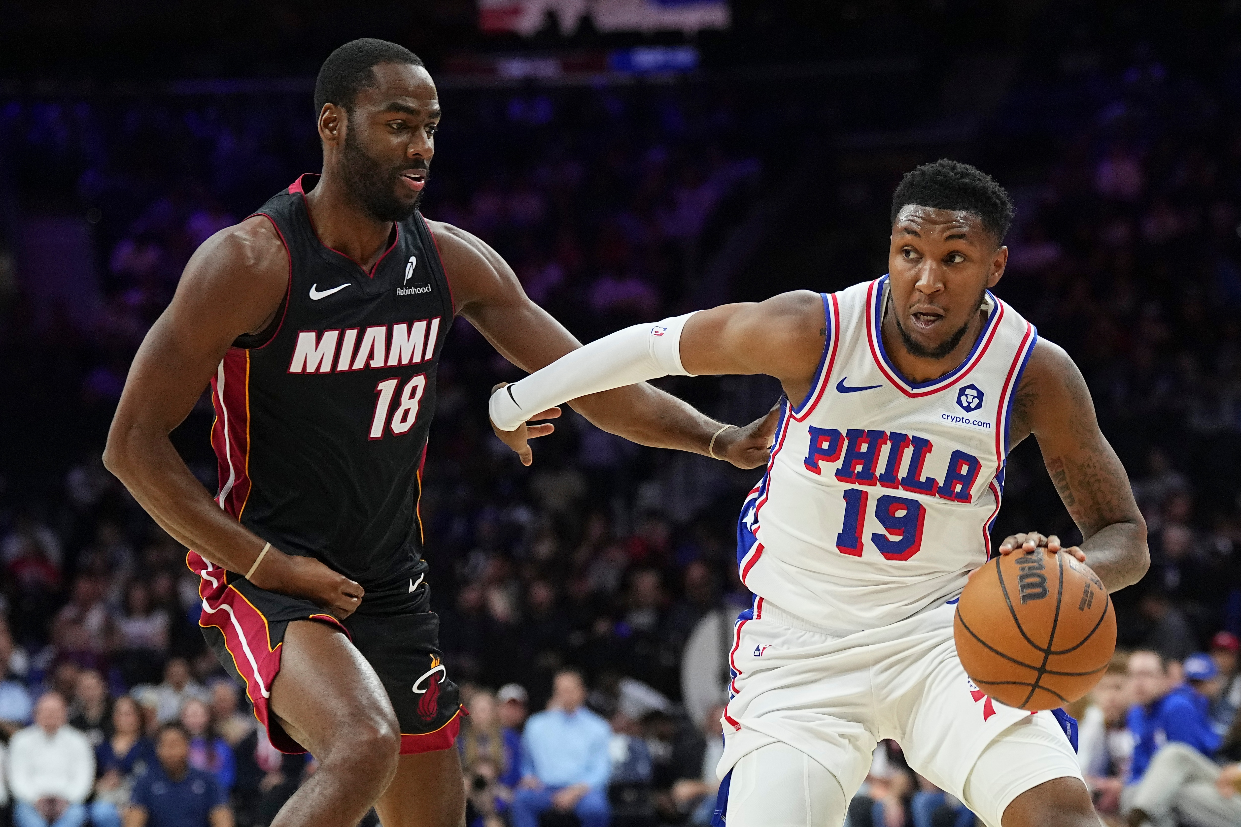Justin Edwards #19 of the Philadelphia 76ers dribbling down the court