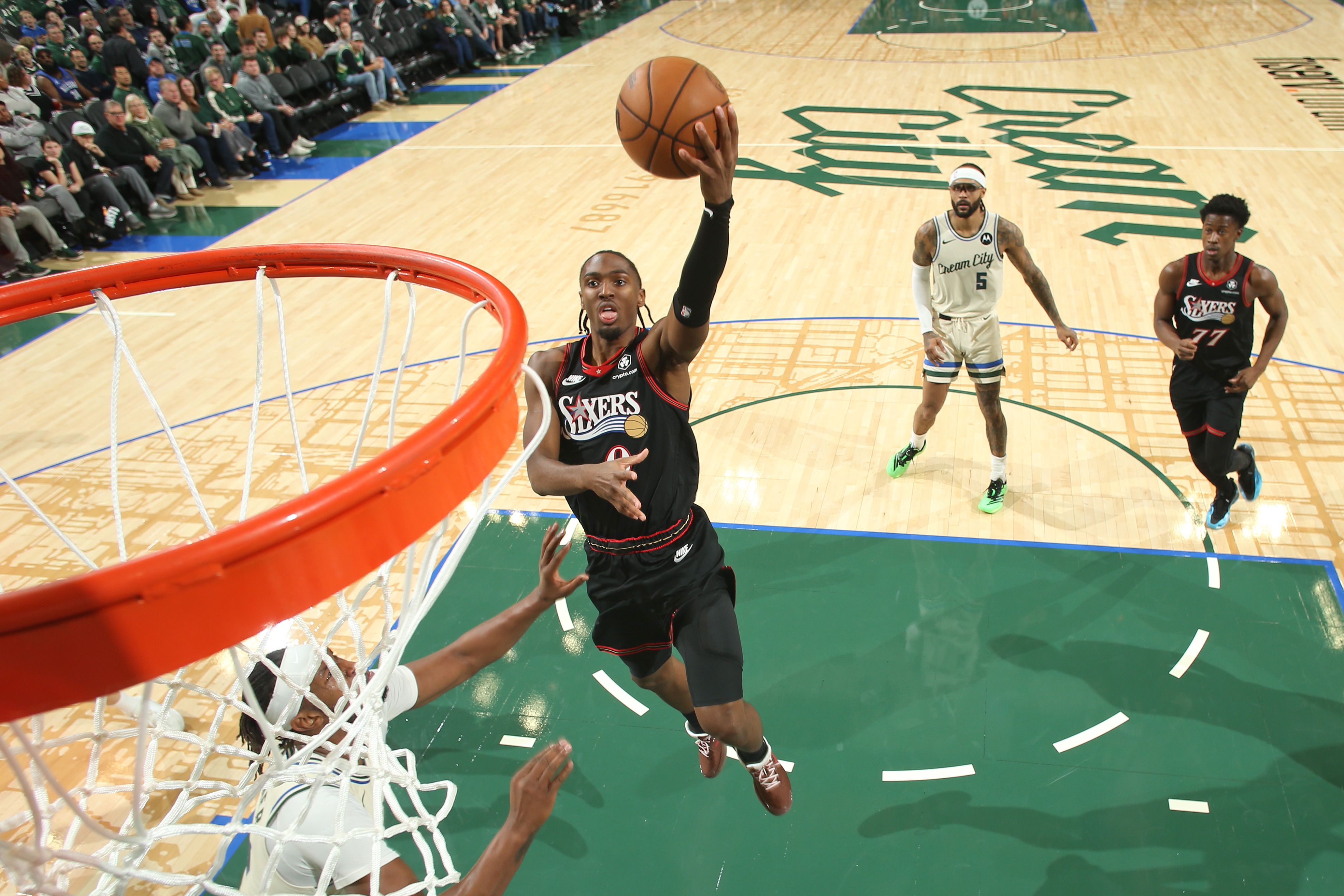 Tyrese Maxey #0 of the Philadelphia 76ers drives to the basket during the game