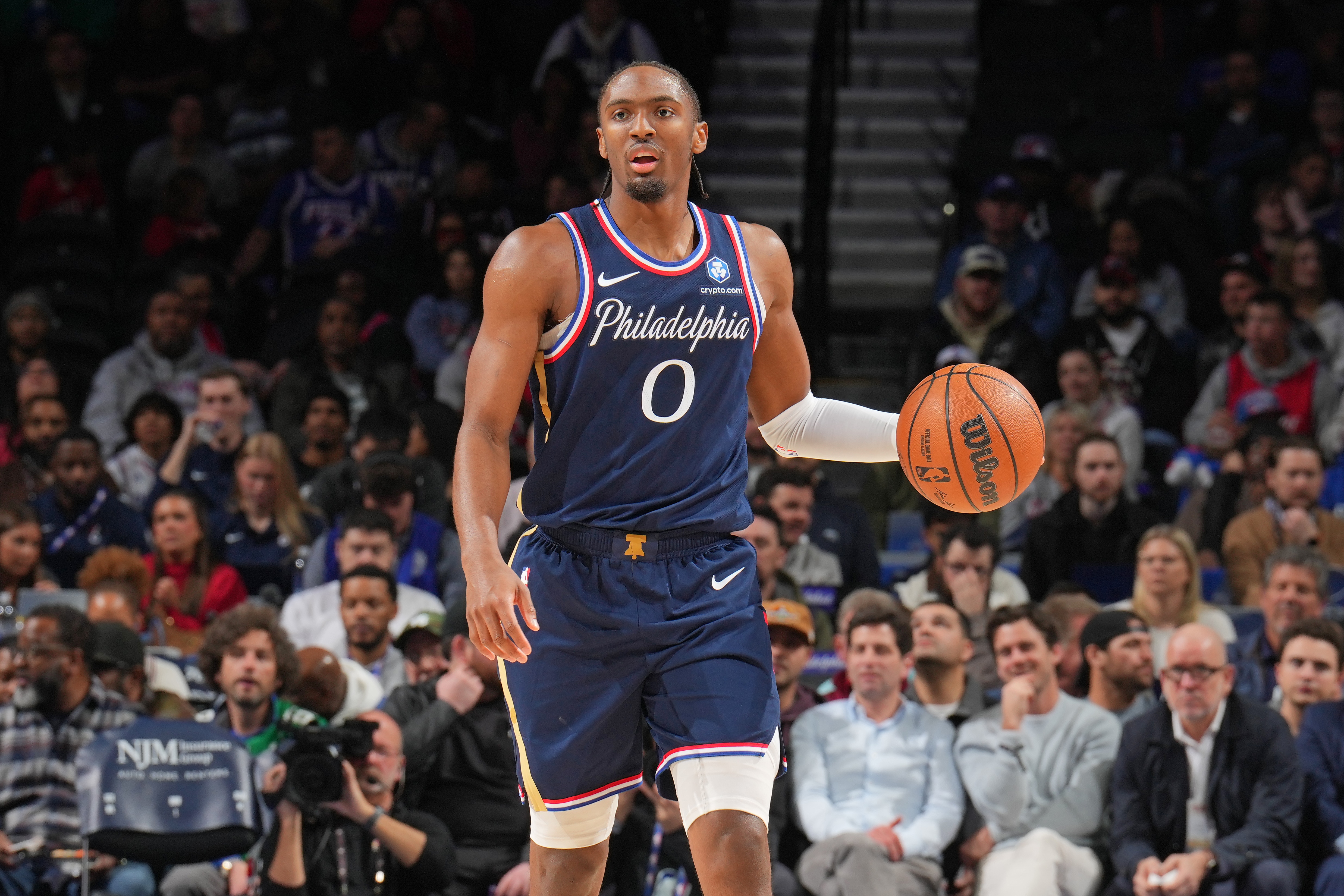 Tyrese Maxey #0 of the Philadelphia 76ers dribbles the ball during