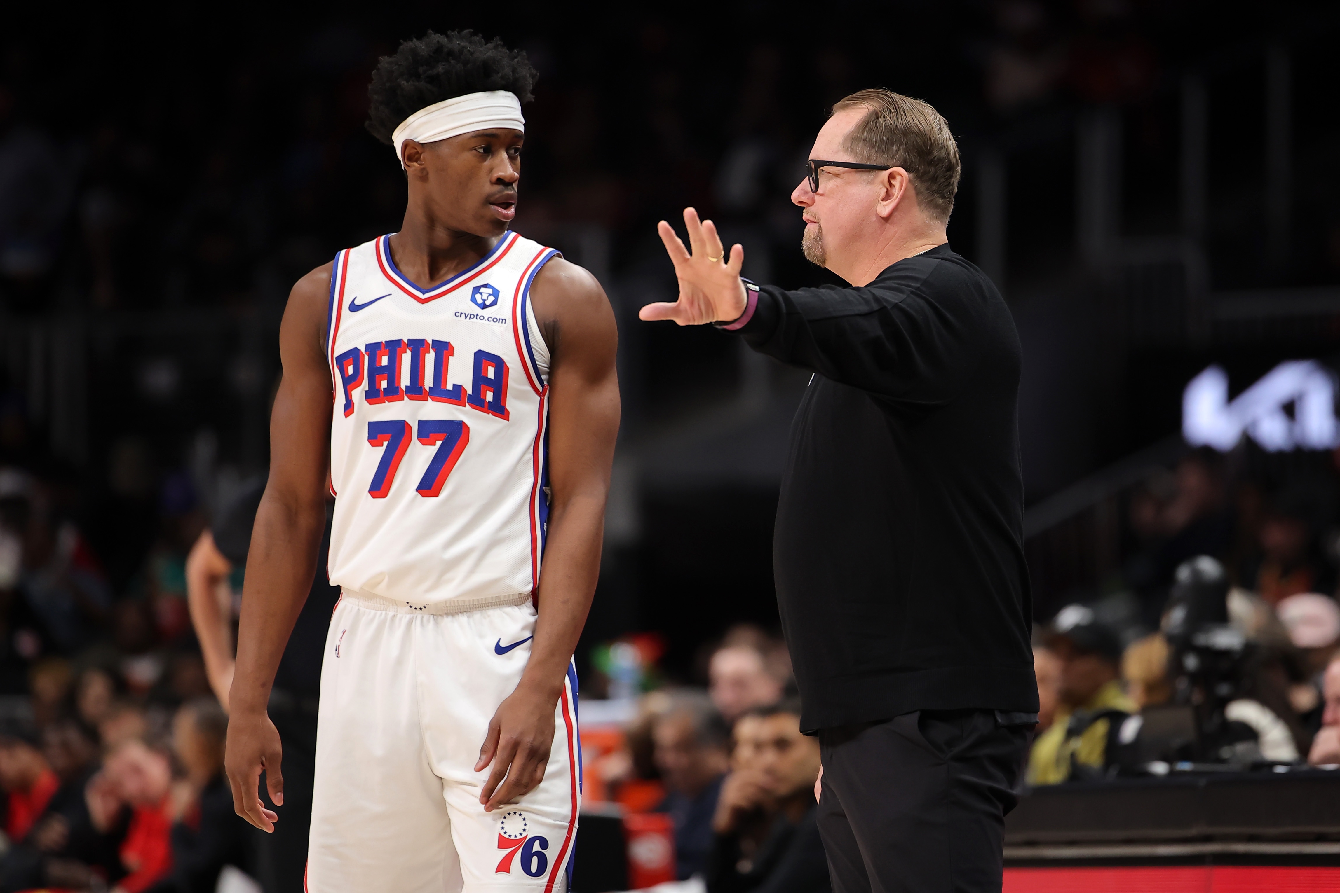 Nick Nurse of the Philadelphia 76ers talks to Vj Edgecombe #77 during the first half