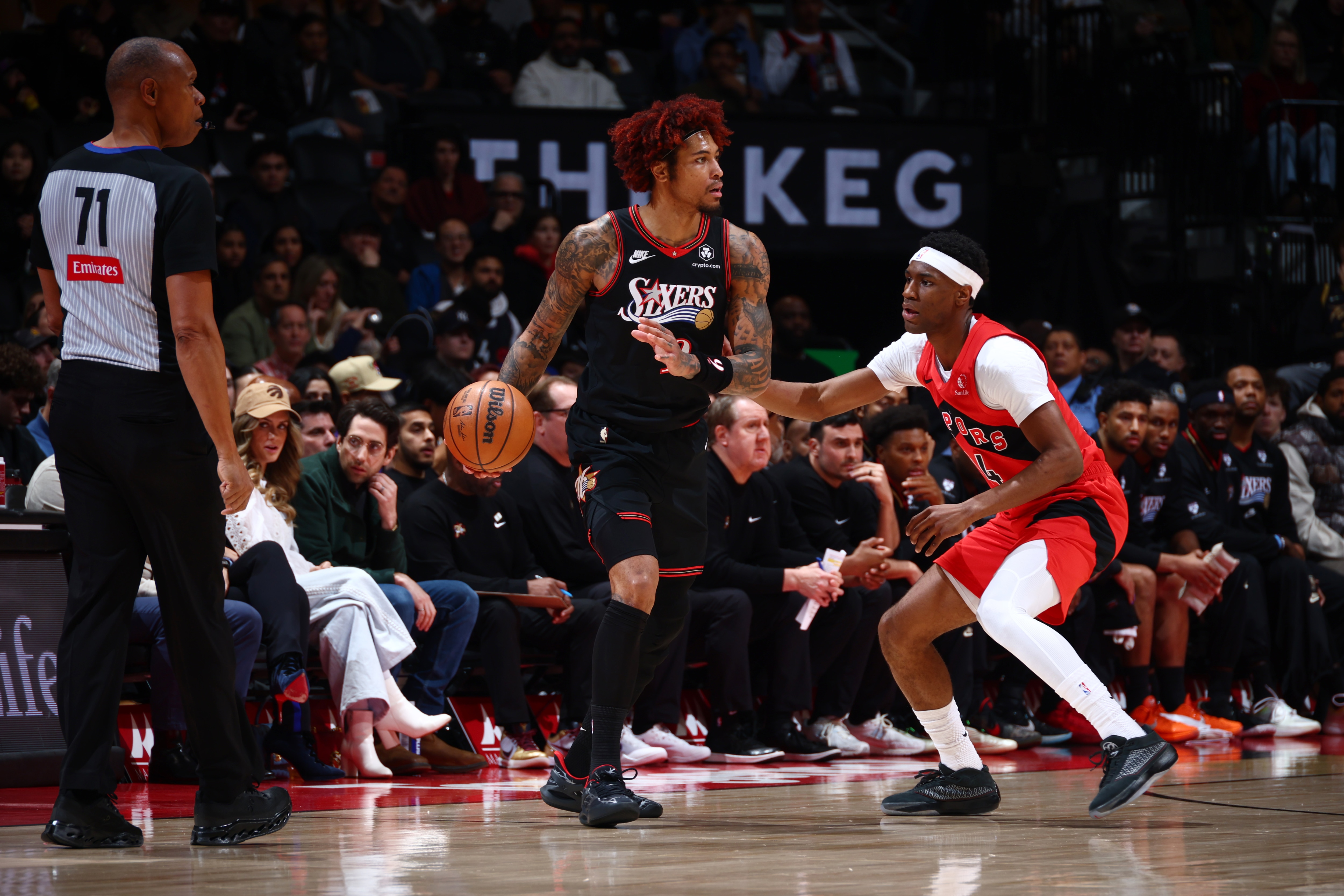 Kelly Oubre Jr. #9 of the Philadelphia 76ers looks to pass the ball during the game