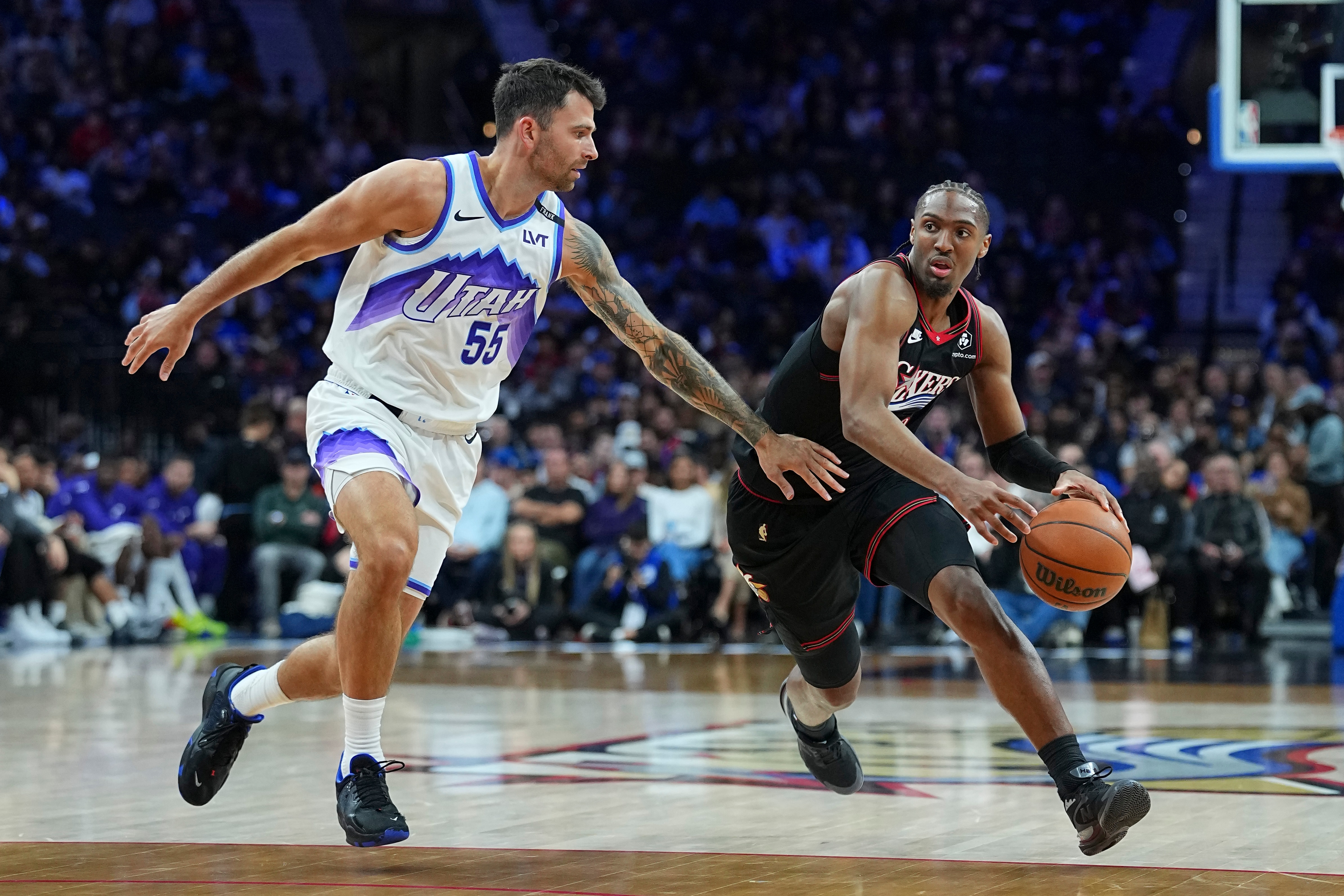 Tyrese Maxey #0 of the Philadelphia 76ers dribbles the ball