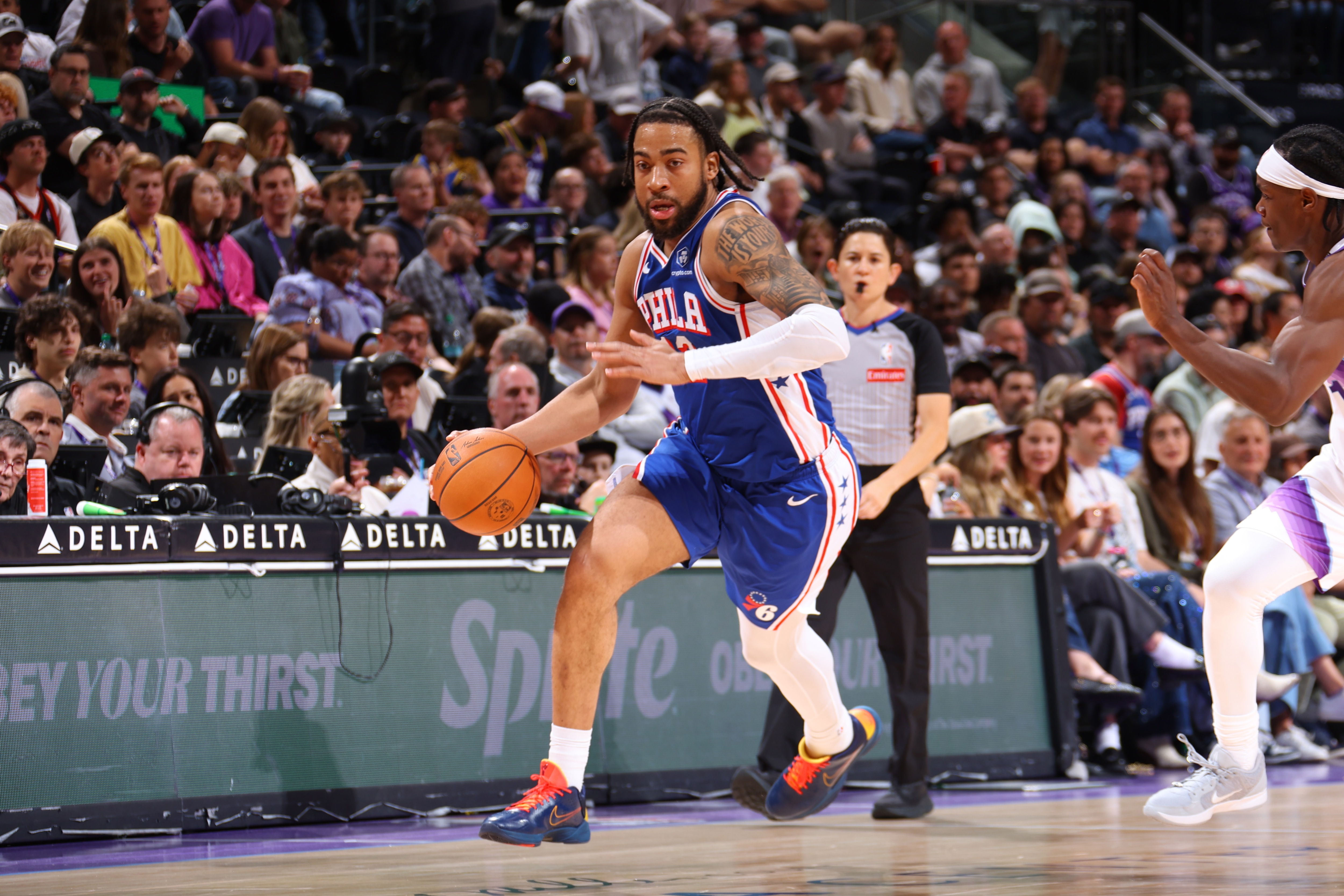 Trendon Watford #12 of the Philadelphia 76ers dribbles the ball during the game against