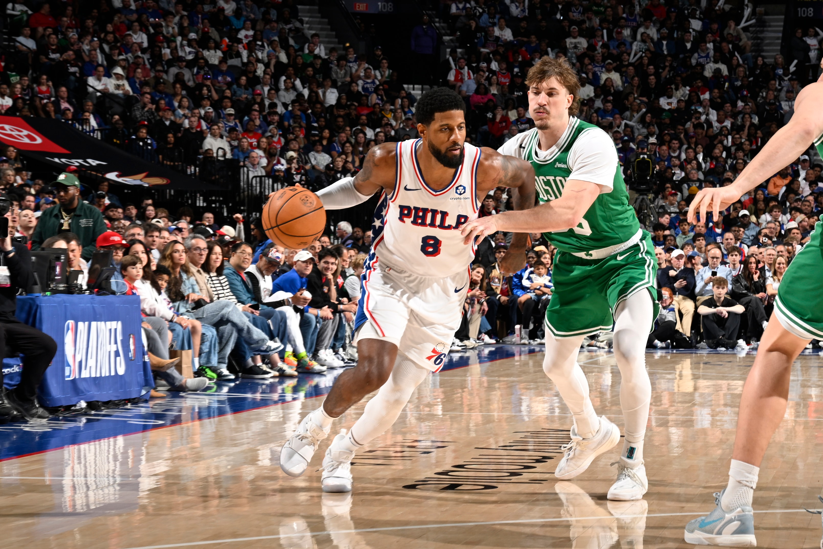 Paul George #8 of the Philadelphia 76ers dribbles the ball during the game