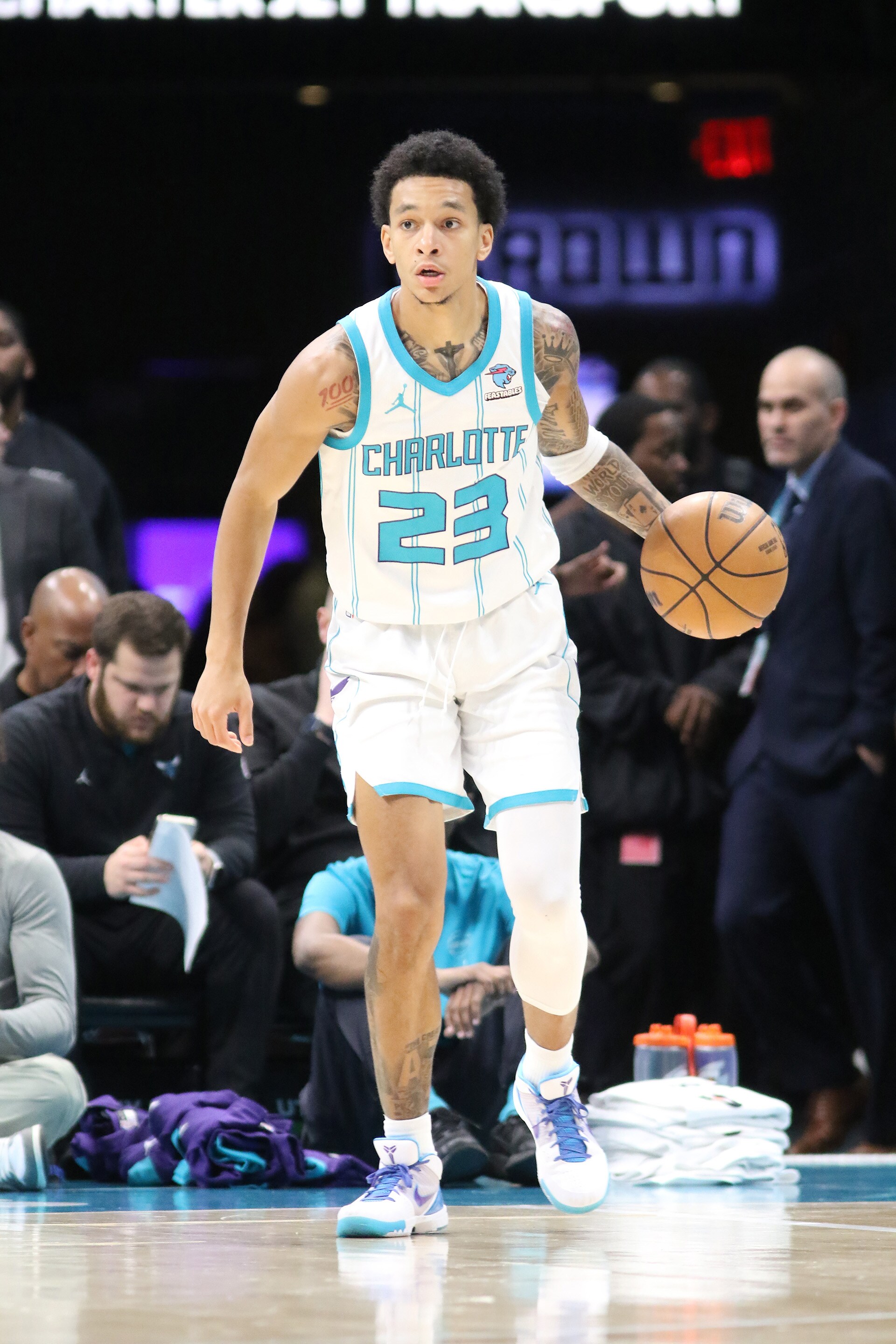 Slideshow-image: CHARLOTTE, NC - APRIL 3:  Tre Mann #23 of the Charlotte Hornets handles the ball during the game against the Portland Trail Blazers on April 3, 202...